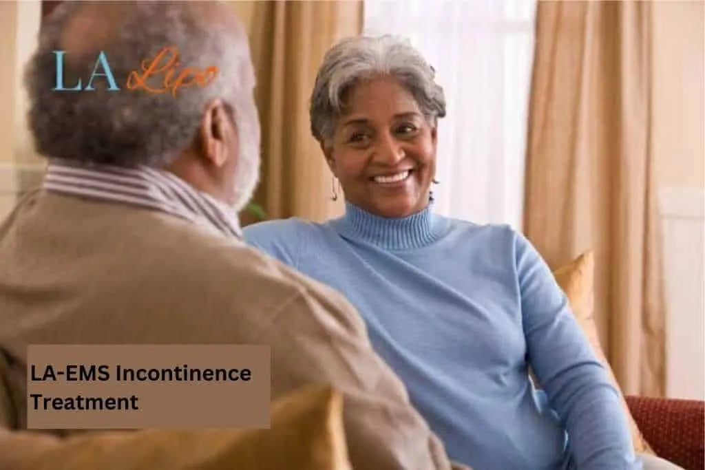 Couple sat smiling at each other - LA-EMS treatment Blackheath