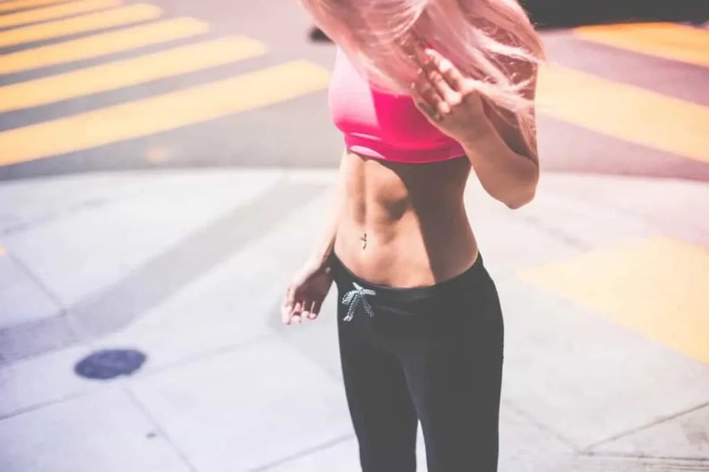 Woman with toned stomach after LA-EMS Body Sculpting Treatment Blackheath